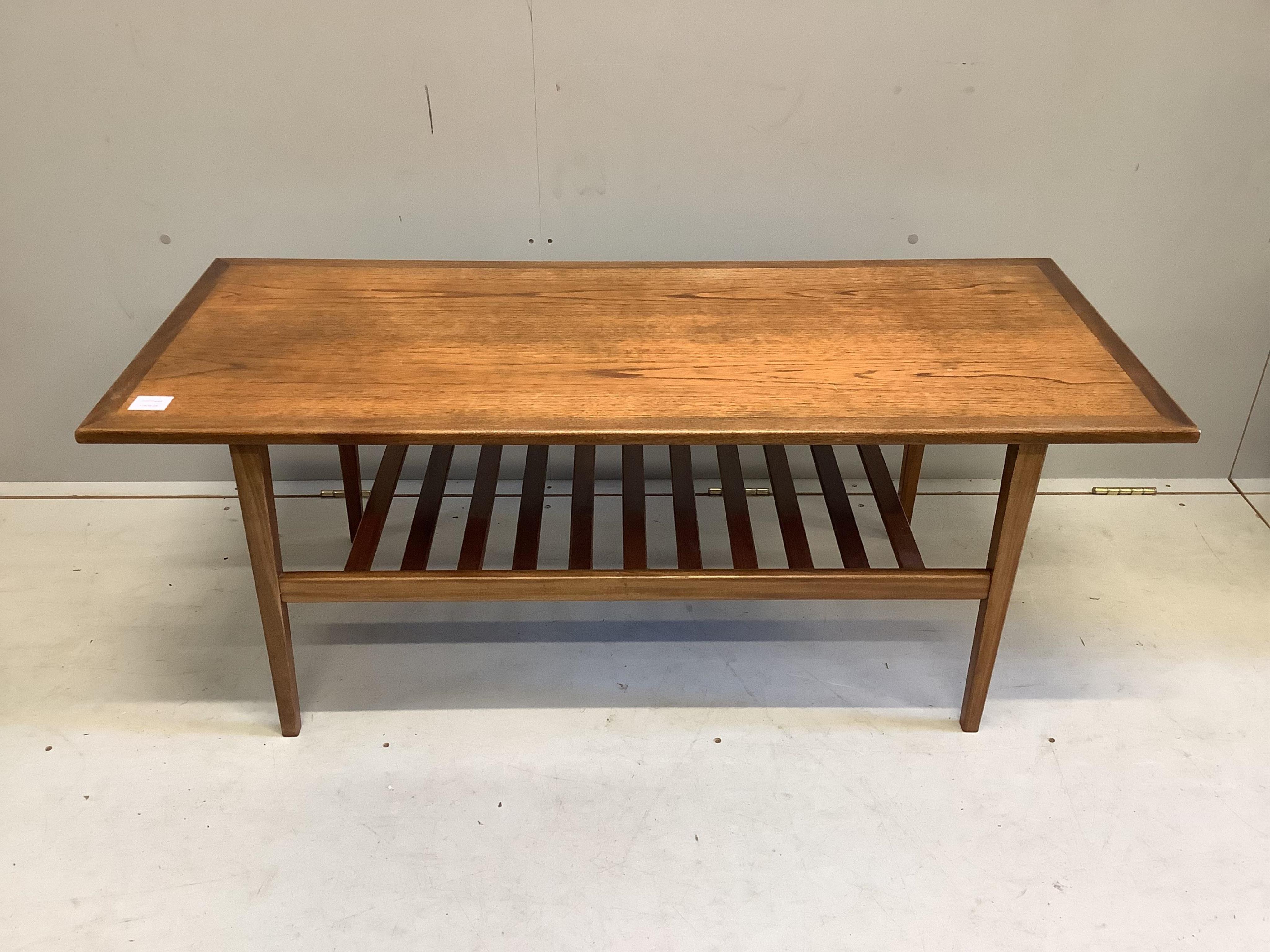 A mid century rectangular teak two tier coffee table, width 122cm, depth 51cm, height 48cm